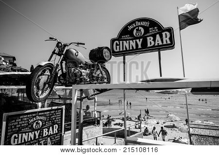 SOZOPOL BULGARIA - AUGUST 24 2017: Ginny Bar on the public beach of an ancient seaside town on the Black Sea Bulgarian Black Sea Coast. Black and white.