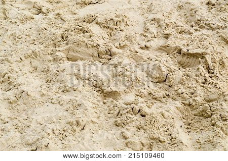 light yellow sand on the beach background