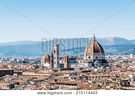 Florence, Italy - August 23, 2016:  Florence Cityscape from Michelangelo Piazzale. The square is dedicated to the Renaissance sculptor and is a famous tourist attraction