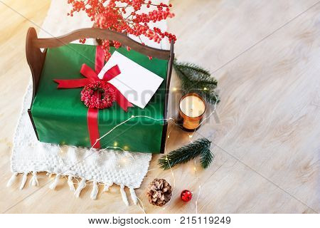 Homemade Wrapped Christmas Present With Tools And Decorations. Top View. Packing Christmas Gifts.