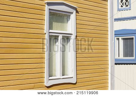 Traditional wooden houses facade in Rauma town. Finland heritage. Horizontal