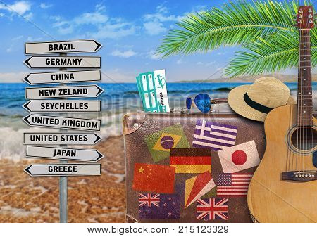 Concept of summer traveling with old suitcase
