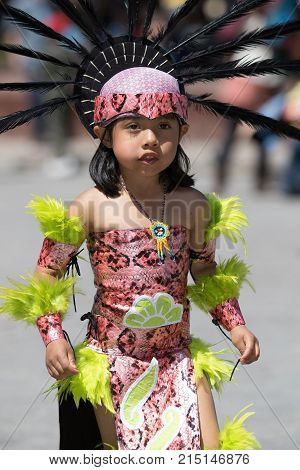 March 6, 2016 San Miguel de Allende Mexico: indigenous child dressed in traditional costume performing ritual dance at the Senior de la Conquista celebration