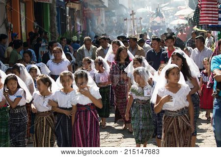 March 24, 2016 San Pedro la Laguna, Guatemala: girls dressed in traditional clothing children's procession during Easter Holy Week