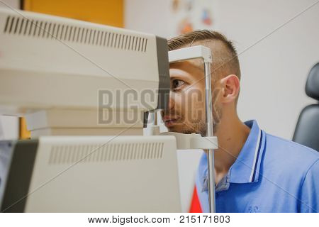 Close Up Head Of Young Patient Fix In A Non-mydriatic Retinal Camera