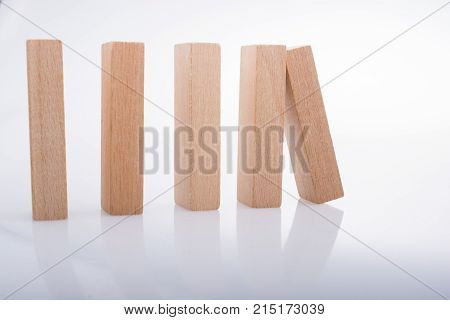 Wooden Domino Blocks On White Background