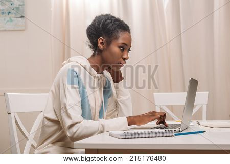 African American Woman Using Laptop