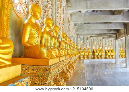 Golden Buddha statue meditation in measure Thailand.