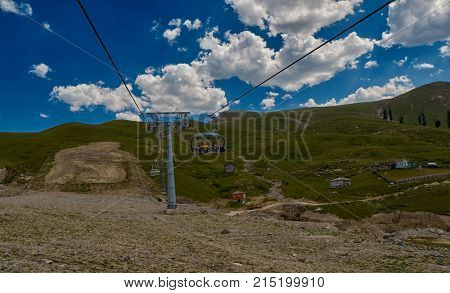 GODERDZI, GEORGIA - 08 AUGUST 2017: Newly-built modern Cable Car and Rural mountain landscapes of Georgian Adjara region near Goderdzi ski resort and village of Khulo