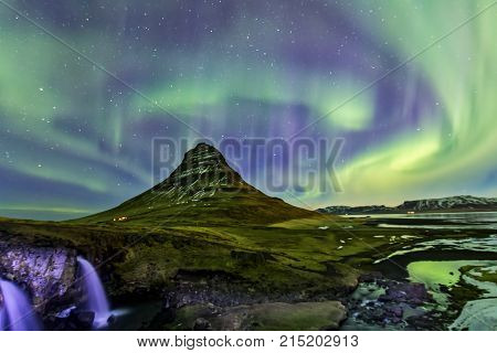 Northern Light Aurora Borealis At Kirkjufell Iceland With Fully Start In The Sky