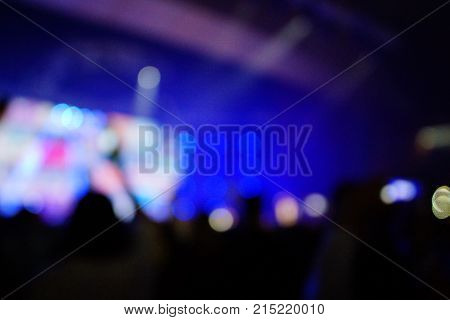 Texture Blur Scene Multicolored Lights And Smoke In Concert With Silhouettes Of Peoplebackground For
