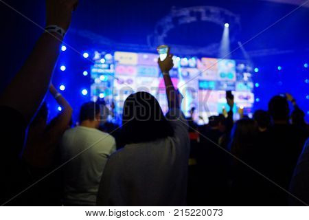 Texture Blur Scene Multicolored Lights And Smoke In Concert With Silhouettes Of Peoplebackground For