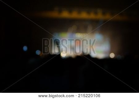 Texture Blur Scene Multicolored Lights And Smoke In Concert With Silhouettes Of Peoplebackground For