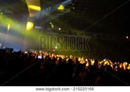 Texture Blur Scene Multicolored Lights And Smoke In Concert With Silhouettes Of Peoplebackground For