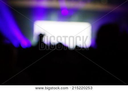 Texture Blur Scene Multicolored Lights And Smoke In Concert With Silhouettes Of Peoplebackground For