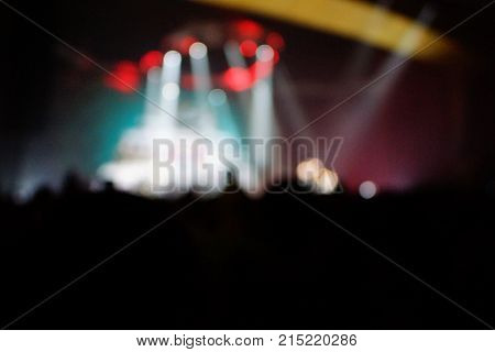 Texture Blur Scene Multicolored Lights And Smoke In Concert With Silhouettes Of Peoplebackground For