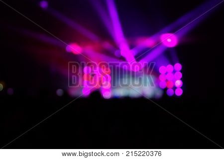 Texture Blur Scene Multicolored Lights And Smoke In Concert With Silhouettes Of Peoplebackground For