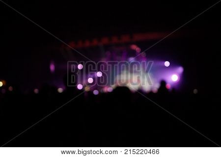 Texture Blur Scene Multicolored Lights And Smoke In Concert With Silhouettes Of Peoplebackground For