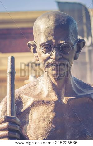 Wellington, New Zealand, 28 September 2015: life-sized statue of Indian political and spiritual leader Mahatma Gandhi at Wellington railway station by Indian sculptor Gautam Pal.