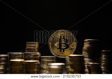 Photo Golden Bitcoins new virtual money on black background