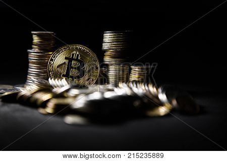Photo Golden Bitcoins new virtual money on black background