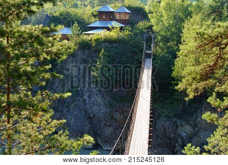 Suspension Bridge To Island Of Patmos. Chemal, Altai Republic, Russia