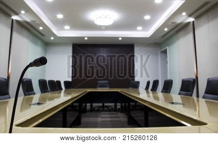 Microphone and modern table boardroom with chair black. luxurious meeting room in a big corporation