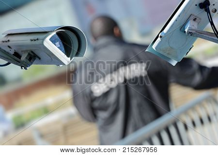 Security Cctv Camera Or Surveillance System With Vigil On Blurry Background