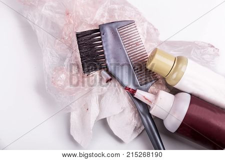 Close-up Of Chemical Hair Color Dye Set With Comb Brush