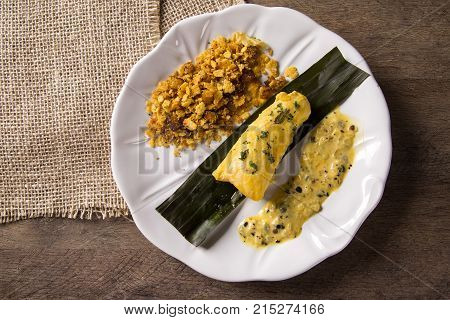 Fried Fish With Farofa And Passion Fruit Sauce - Traditional Amazonian Dish - Filhote Caboclo