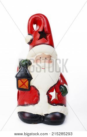Santa Claus Christmas decoration.. Christmas figurine on isolated white background. Studio photo. Cute.