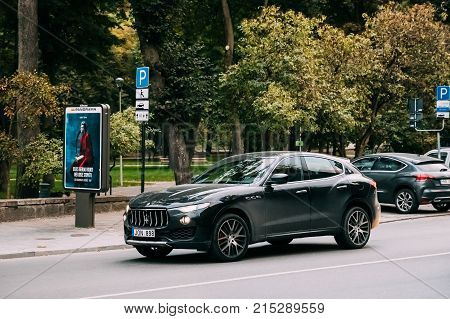 Vilnius, Lithuania - September 28, 2017: View Of Luxury White Color Maserati Levante Car Moving On Street