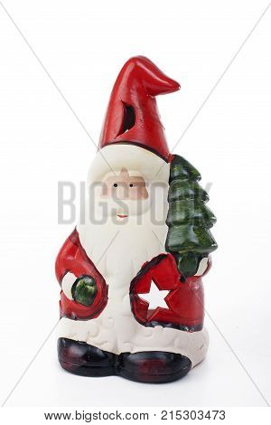 Santa Claus Christmas decoration.. Christmas figurine on isolated white background. Studio photo. Cute.