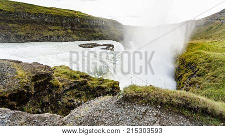 Water Current Of Gullfoss Waterfall In Canyon