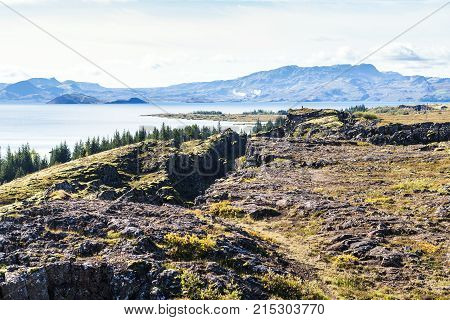Rocks And Thingvallavatn Lake In Thingvellir Park