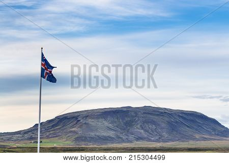 Icelandic Flag And View Of Mount In Iceland