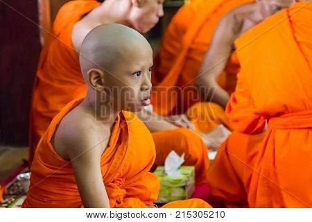 Novice And Monks In Merit Making