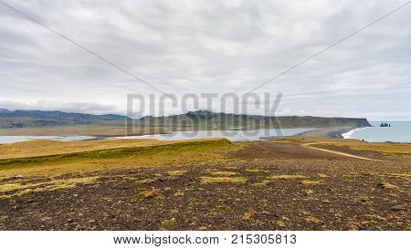 Dyrholaey Peninsula And Volcanic Beach In Iceland