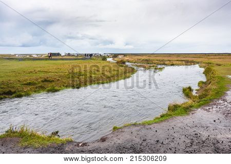 Riverbanks Of Seljalands River In Autumn