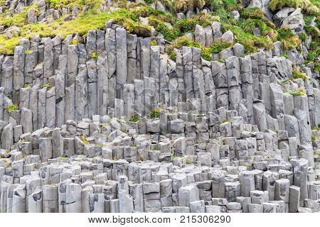 Volcanic Wall Of Reynisfjall Mount In Iceland