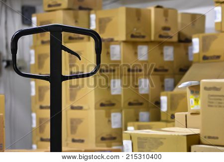Hand Pallet Truck Inside the Warehouse. Interior.