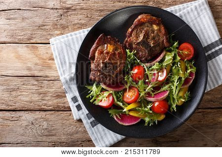 Spicy Delicious Lamb Steak And Salad From Radish, Tomatoes, Pepper And Lettuce Close-up. Horizontal