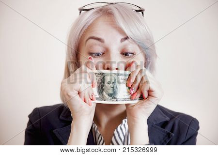 Business Woman Covering Her Mouth With A Dollar Banknote As Symbol Of Bribery Cheating Financia And 
