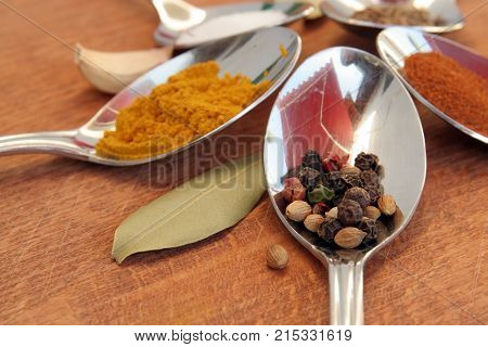 Food seasoning. Cooking spices in a teaspoons.