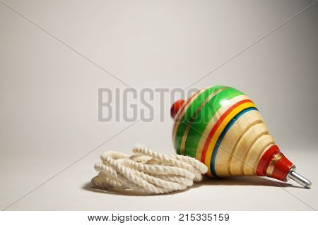 A trompo (mexican toy) with a rope