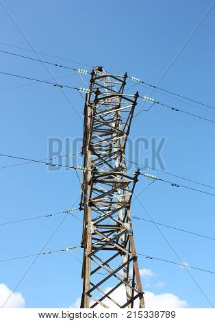 Electrical tower on a background of the blue sky