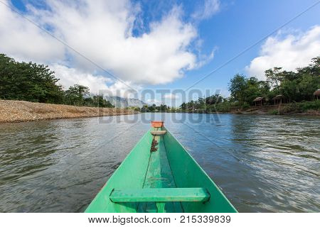 Tourist Take A Boat In Song River At Vang Vieng