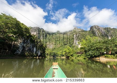 Tourist Take A Boat In Song River At Vang Vieng