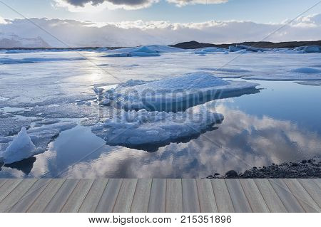 Opening wooden floor Ice freezing winter seasaon lagoon natural landscape background