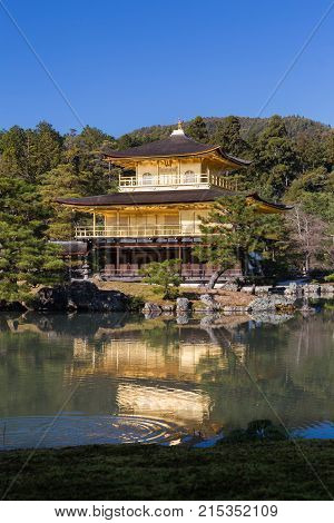 Golden heritage buddish pavilion with water reflection Kyoto Japan landmark